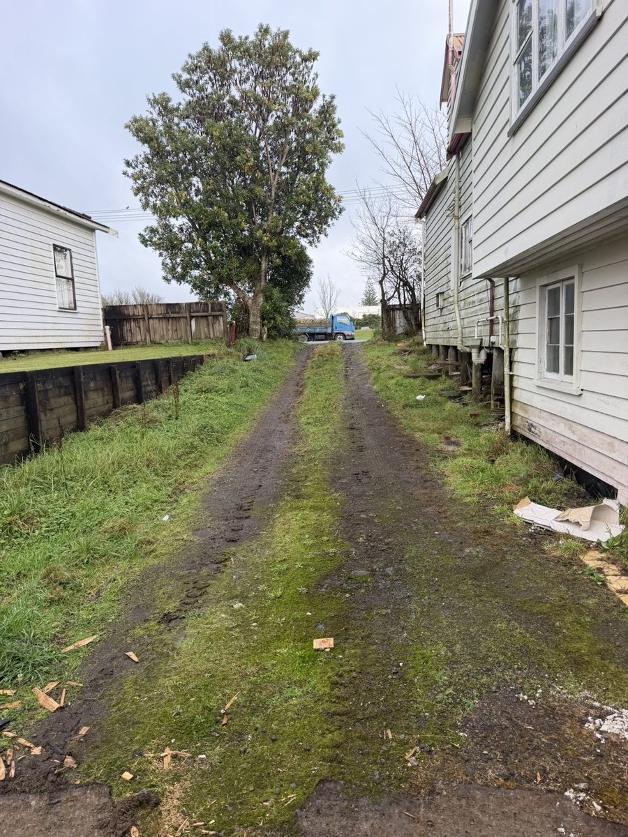 Before: concrete driveway replacing a muddy grass track